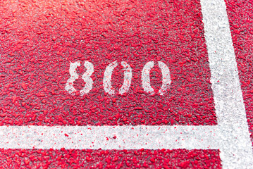 Starting white line zone for 800m, red track.World Athletics Championships concept.Close up.