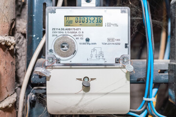 Smart electric power meter counter measuring power usage.Close-up of modern smart grid residential...