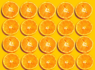Tropical fruit for summer background, pattern of slice fresh ripe orange texture on orange color...