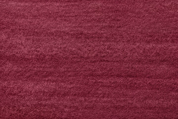 Abstract art background dark red and wine colors. Watercolor painting on canvas with soft maroon gradient.