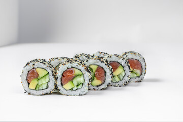 Sushi California roll in sesame with trout.