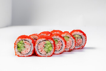 California sushi roll in tobiko with crab meat.