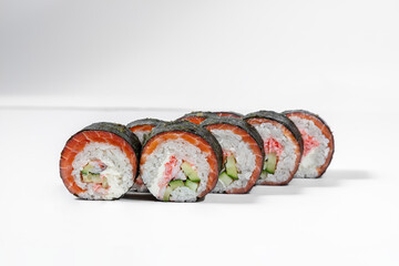 Sushi roll with crab and salmon.