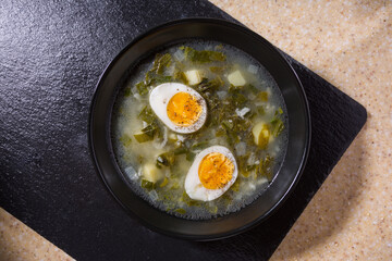 Vegetable soup with boiled cut egg
