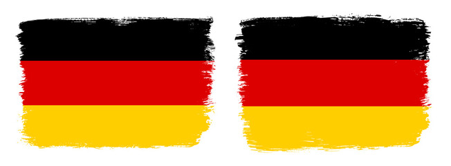 A set of two vector brush flags of Germany with abstract shape brush stroke effect