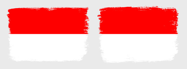 A set of two vector brush flags of Indonesia with abstract shape brush stroke effect