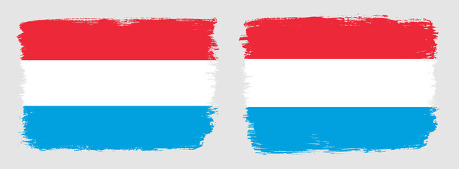 A set of two vector brush flags of Luxembourg with abstract shape brush stroke effect