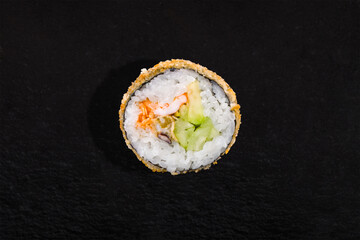 Warm breaded roll with nori, rice, cucumber, avocado, shrimp