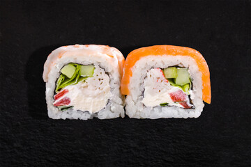 Rolls with salmon, nori,  shrimps, crab