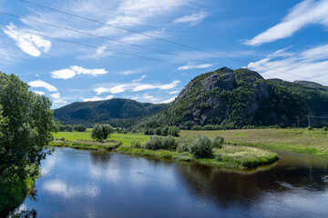 Fototapeta na wymiar Steinsdalselva in Norway on a sunny day , salmon river Norway 