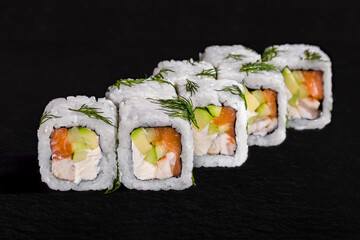 Rolls with dill, rice, nori, cream cheese, cucumber