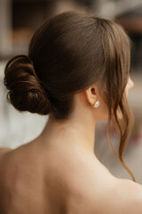 Fototapeta premium portrait of a young bride girl in a short white dress