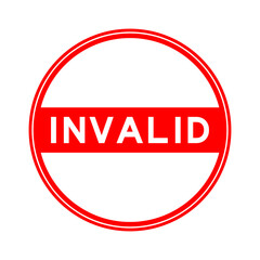 Red color round seal sticker in word invalid on white background