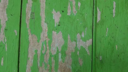 Old wooden wall surface with peeling paint background