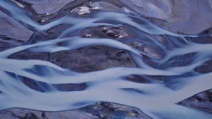 blue glacial river, top down	