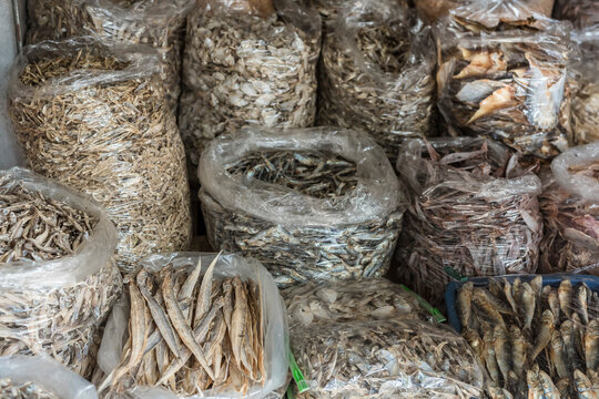 Sacks of various dried fish at a public market in Sual, Pangasinan, Philippines.