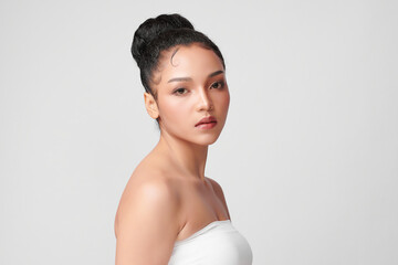 Fototapeta na wymiar Beautiful young asian woman with clean fresh skin on grey background, Face care, Facial treatment, Cosmetology, beauty and spa, Asian women portrait.
