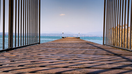 A lonely jetty on lake garda