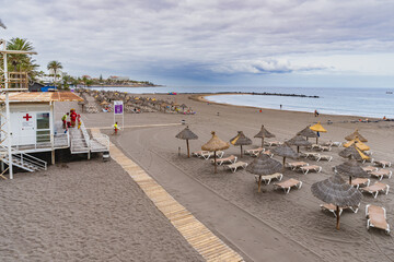 Costa Adeje, Tenerife, June 22, 2022. Beach in the touristic Costa Adeje in Tenerife, Canary Islands.