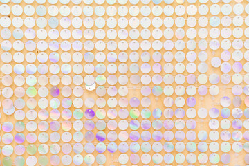 a wall with shiny sequins. glitter and shimmer.
