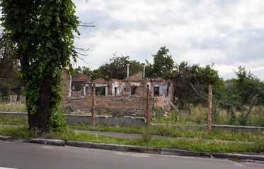 Fototapeta na wymiar private houses destroyed as a result of hostilities in Ukraine