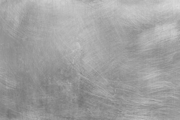 Fototapeta premium Grey scratched old metal surface steel abstract pattern texture silver background