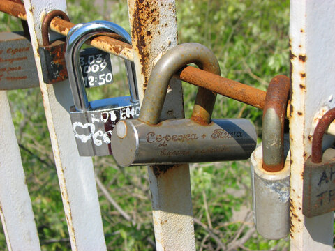 Love locks hang on the bridge in Odessa, Ukraine	
