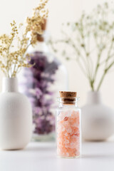 Fototapeta na wymiar Dried herbal flowers with bottle. Homeopathy background.