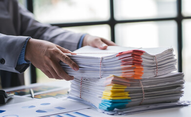 business documents businessman check legal document review Prepare documents or analysis reports,...