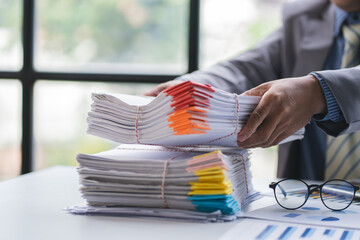 business documents businessman check legal document review Prepare documents or analysis reports,...