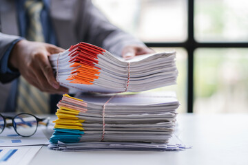 business documents businessman check legal document review Prepare documents or analysis reports,...