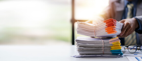 business documents businessman check legal document review Prepare documents or analysis reports,...