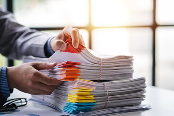 business documents businessman check legal document review Prepare documents or analysis reports,...
