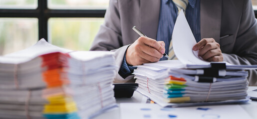 business documents businessman check legal document review Prepare documents or analysis reports,...