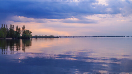 Obraz premium sunset over the river
