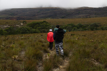 hikers in trail mountain