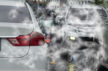 car pollution smoke exhaust automobile pollution traffic jam on road.Car emitting carbon dioxide...