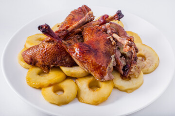 Grilled duck leg on the bone