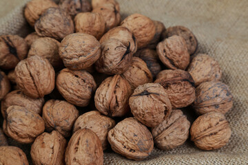 fresh macro walnuts on burlap