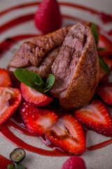 Grilled duck pieces in sauce