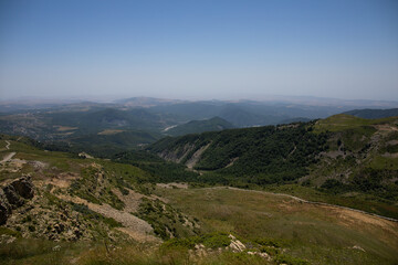Fototapeta na wymiar Mountains and hills landscape in Summer