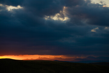 Dark and cloudy sunset in Summer