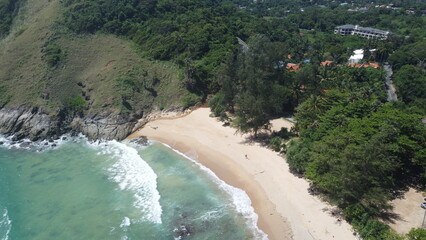 Ya Nui Beach is a charming tiny bay tucked in a cove between the Windmill Viewpoint and the famous...