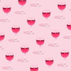 Summer still life scene made with glass, pink cocktail drink, eyelashes and shadows on pastel pink background. Summer vacation refreshment concept.