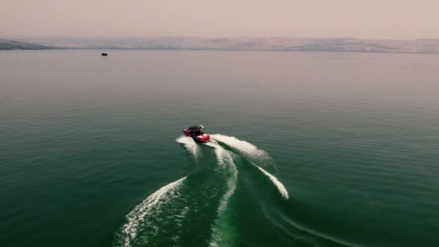 Fast Boad Sails In The Kinneret Lake In Israel Amazing Drone Shot View 4K