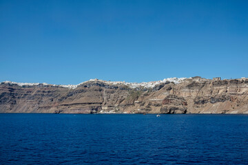 Fototapeta premium View of the picturesque village of Fira and Imerovigli on the top of the hill in Santorini Greece