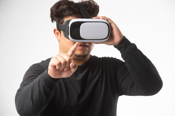 Young asian man using virtual reality headset. VR, future, gadgets, technology concept