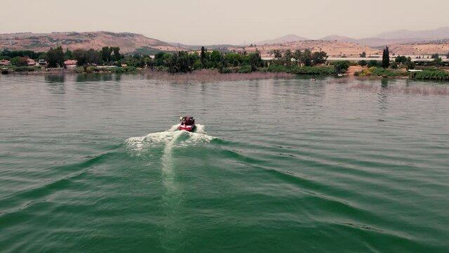 Fast Boad Sails In The Kinneret Lake In Israel Amazing Drone Shot View 4K