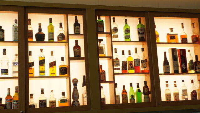Ein-Bokek, Israel - JULY 6:Different brands of booze,  or alcohol in a bar or tavern. Multiple bottles of adult beverages. Wine, whisky, liquor in the shelf