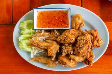 fried chicken pieces with ketchup.
